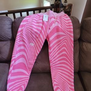 Pink Oversized Nike Suit. Top size L and the Bottom is M.